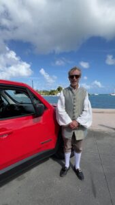 Alexander Hamilton with a Jeep Renegade in front of the Christiansted Harbor